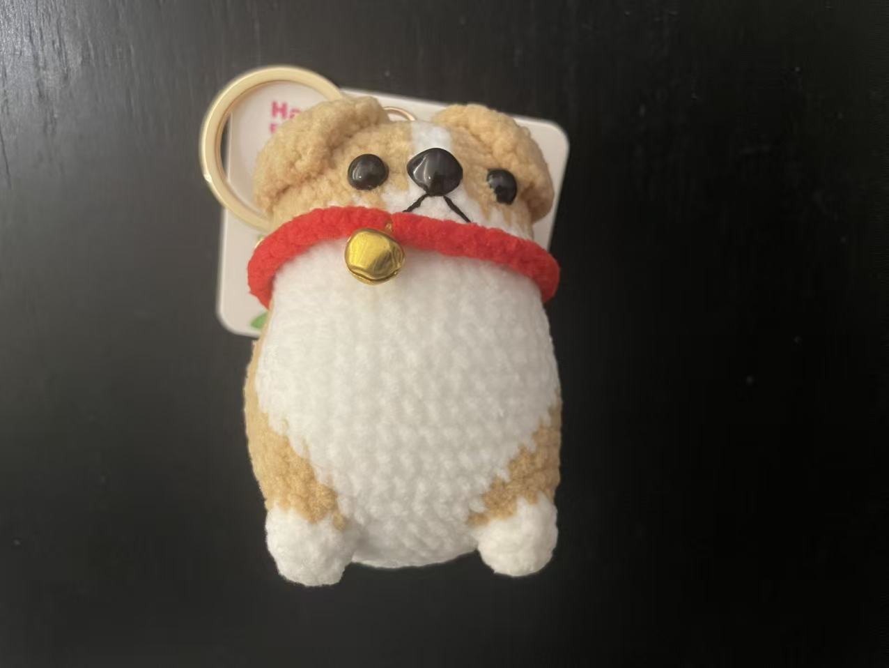 key chain (brown and white dog)